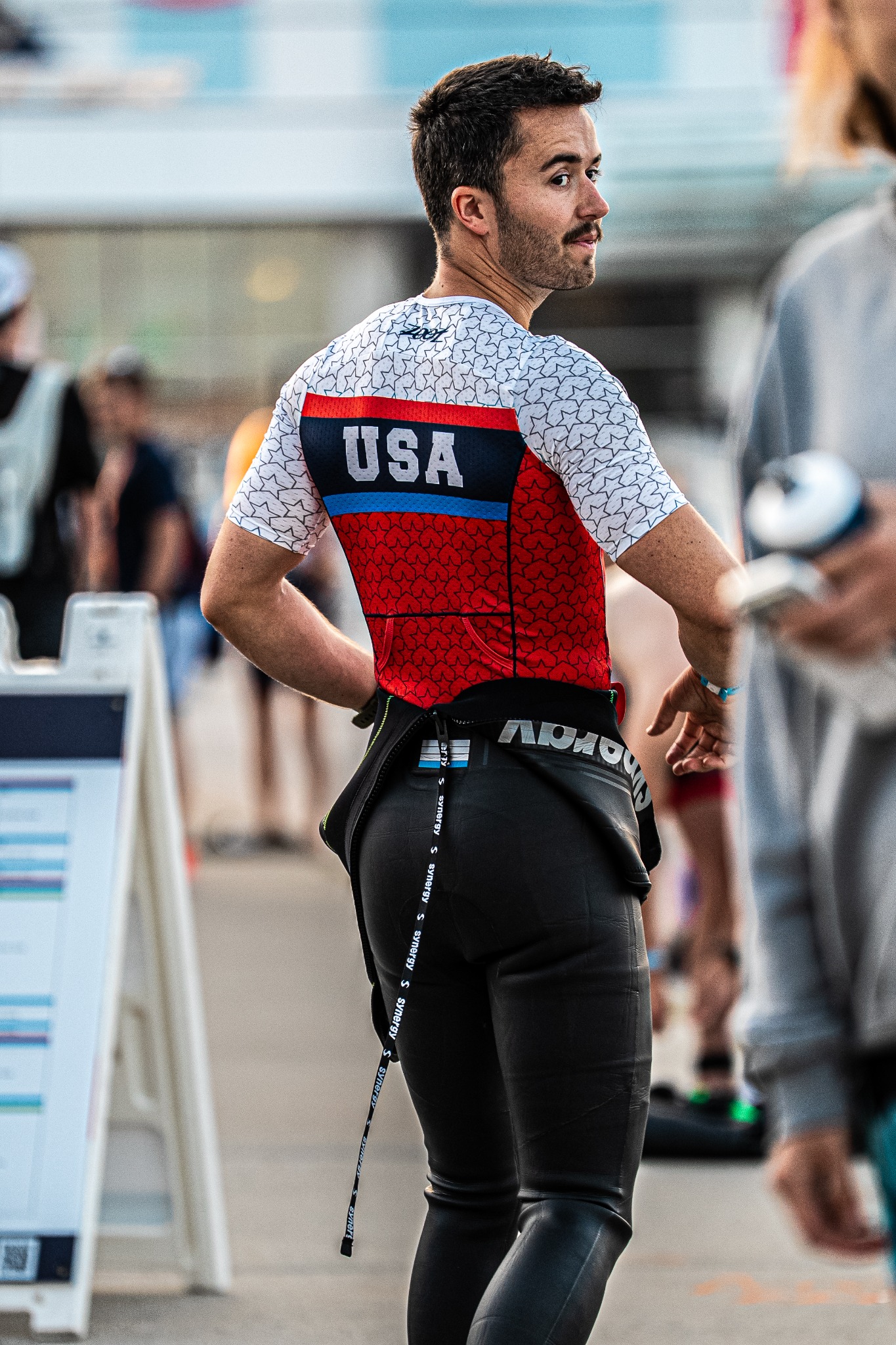 Competitive endurance athlete photographed by GoHybrid during a race transition